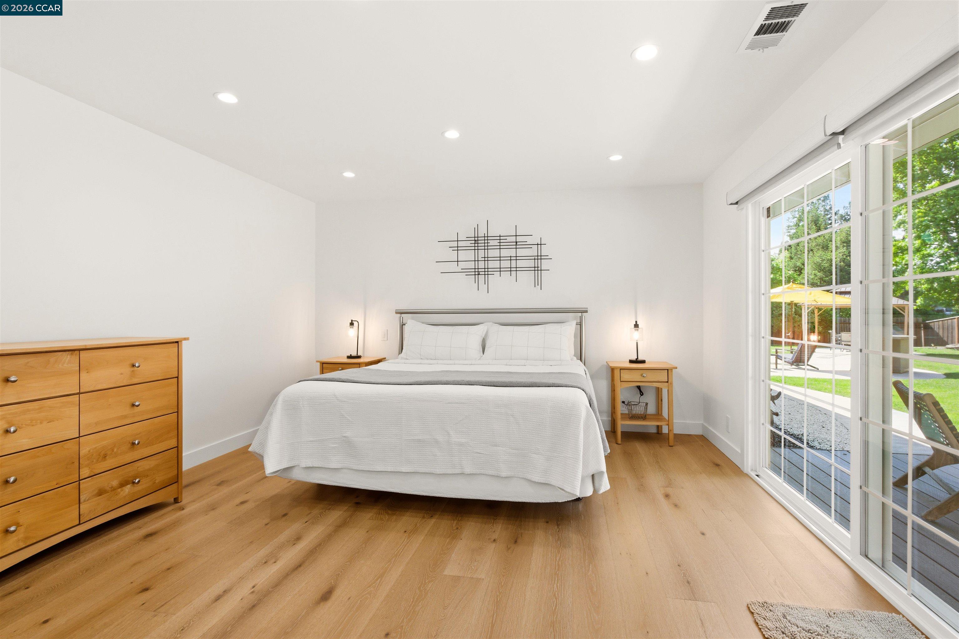 3298 Gloria Terrace Lafayette, CA 94549 - Photo 25 of 40 a bedroom with a bed and a window