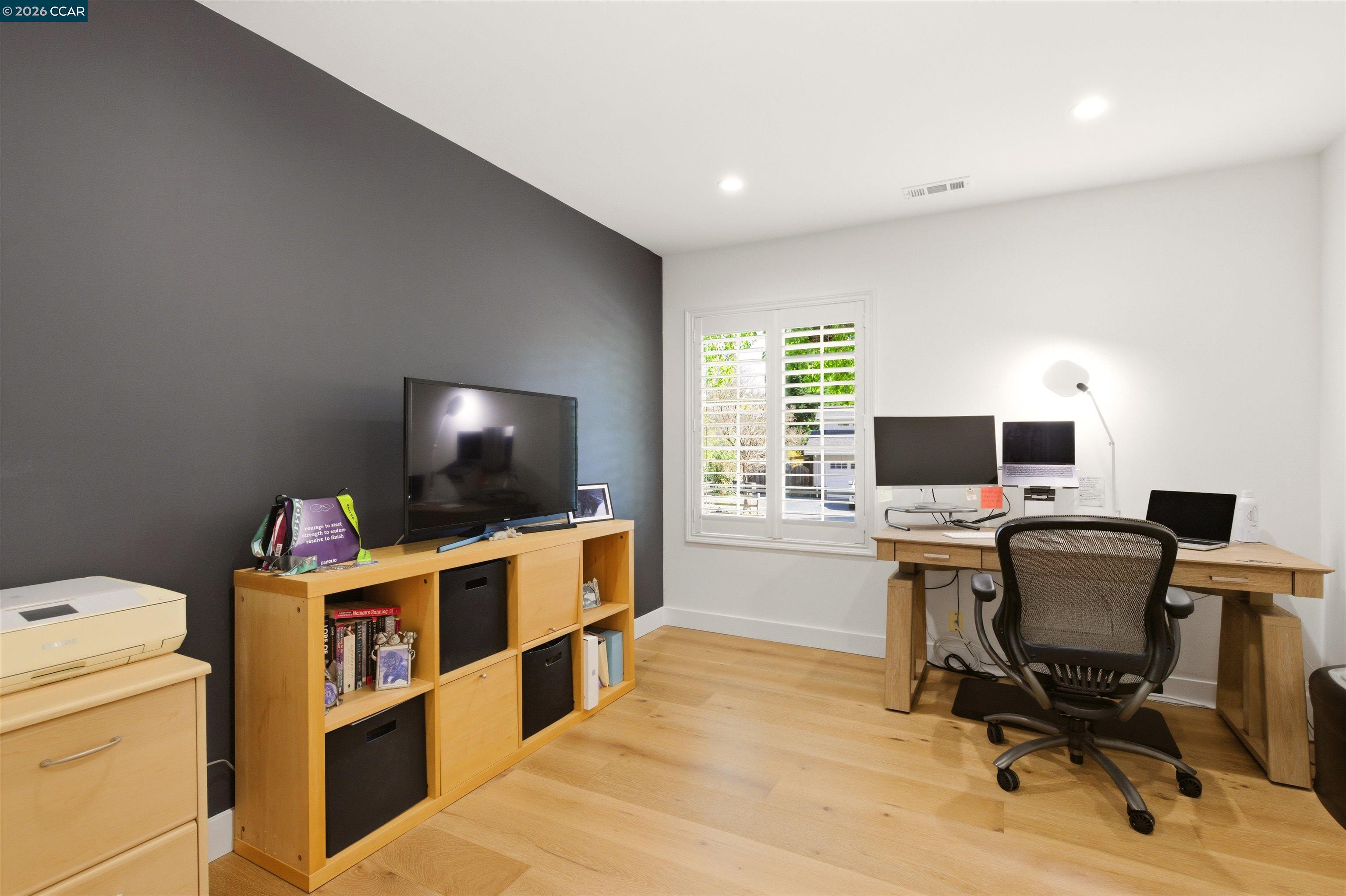 3298 Gloria Terrace Lafayette, CA 94549 - Photo 29 of 40 a view of a workspace with furniture and a window