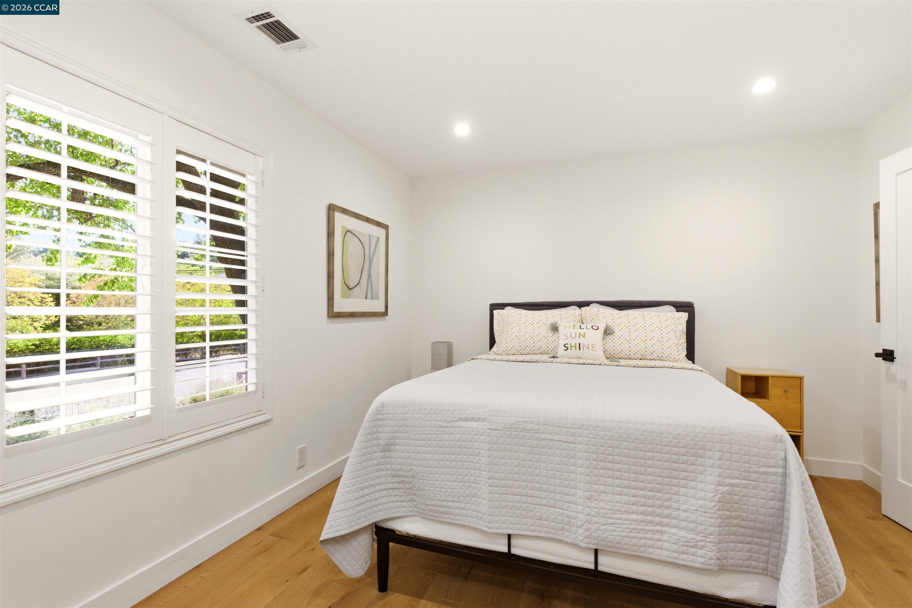 3298 Gloria Terrace Lafayette, CA 94549 - Photo 31 of 40 a bedroom with a bed and a window