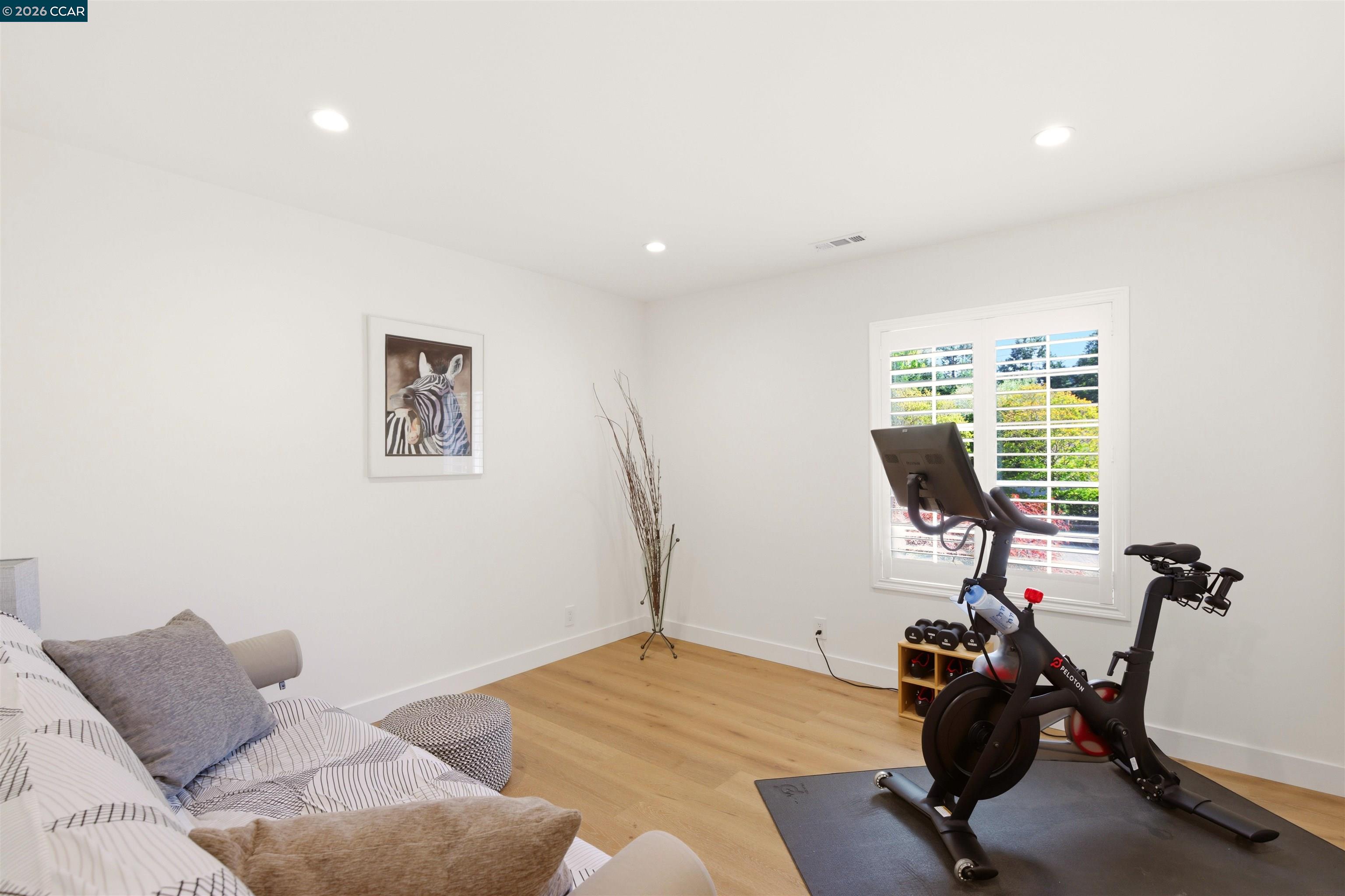 3298 Gloria Terrace Lafayette, CA 94549 - Photo 33 of 40 a room with furniture and wooden floor