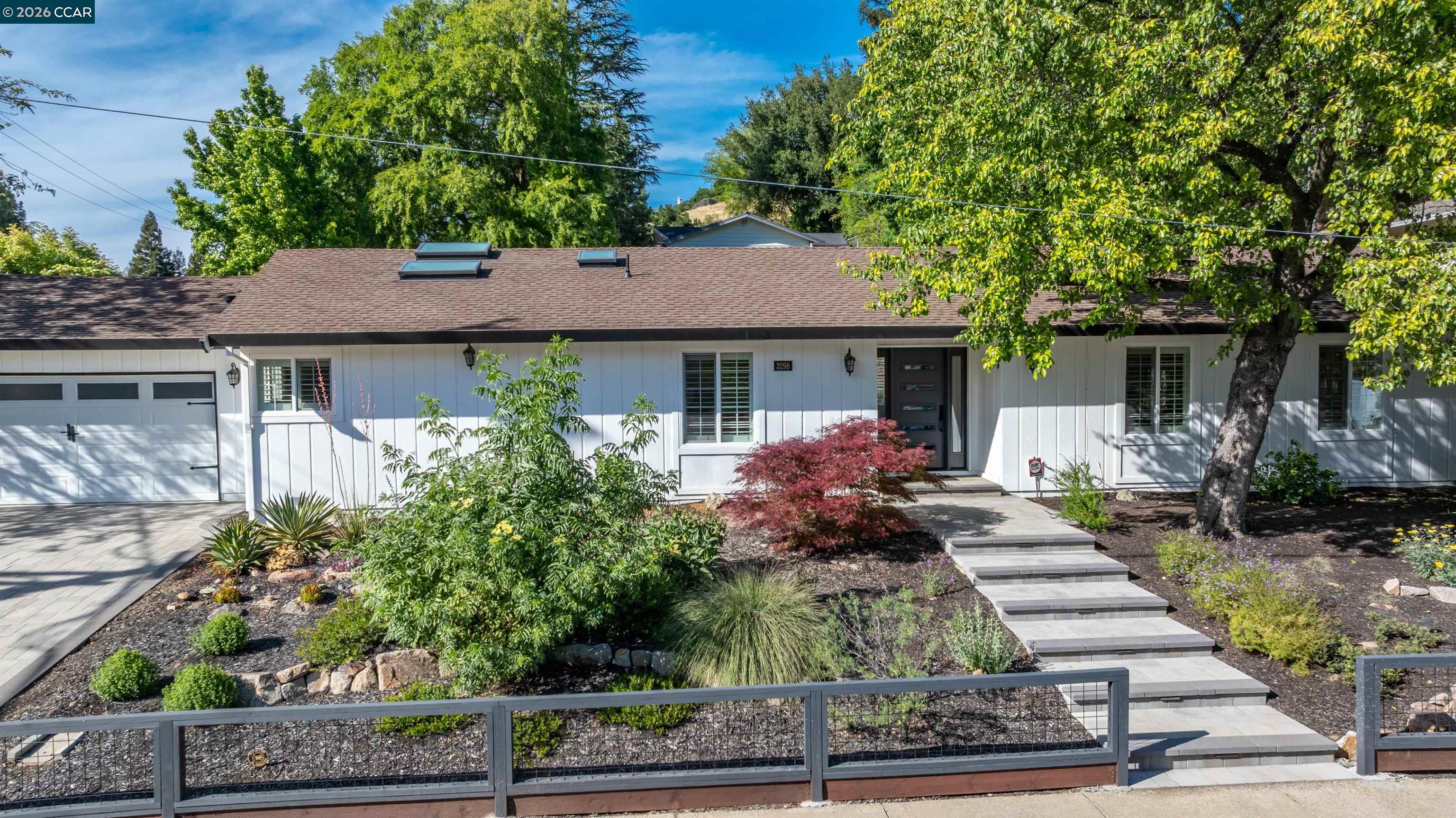 3298 Gloria Terrace Lafayette, CA 94549 - Photo 37 of 40 a front view of a house with garden