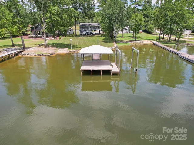 a view of a swimming pool with a lake view