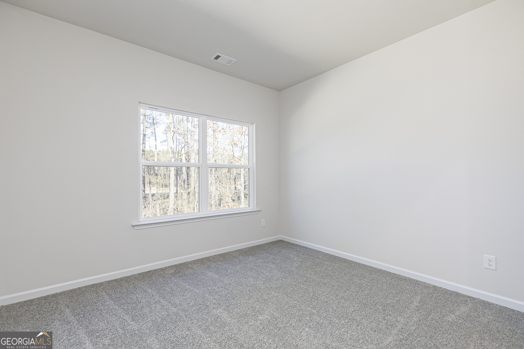 253 Rooker Drive LaGrange, GA 30241 - Photo 12 of 17 an empty room with a window