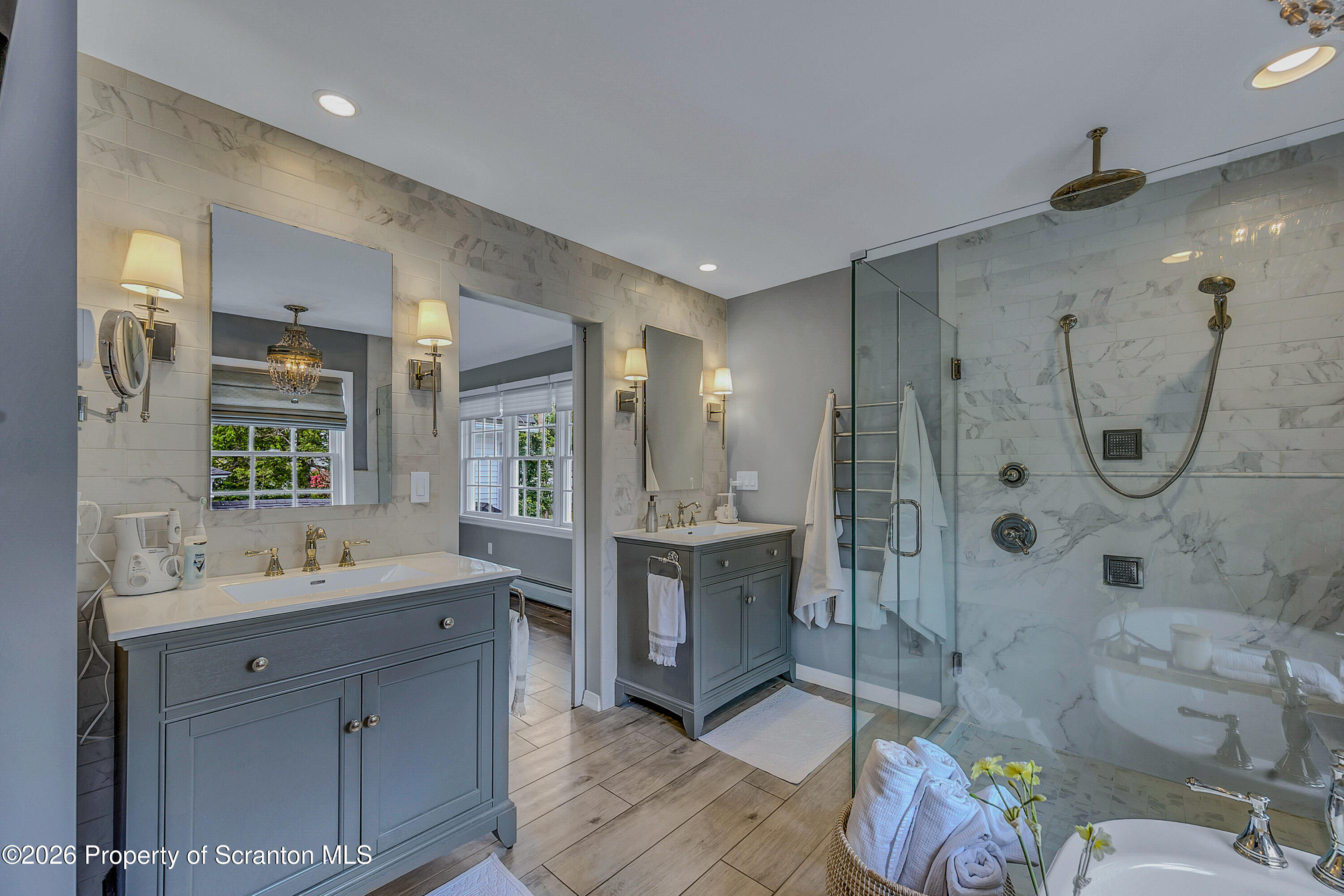 330 Glenburn Road Clarks Green, PA 18411 - Photo 43 of 69 a spacious bathroom with a shower sink mirror and toilet