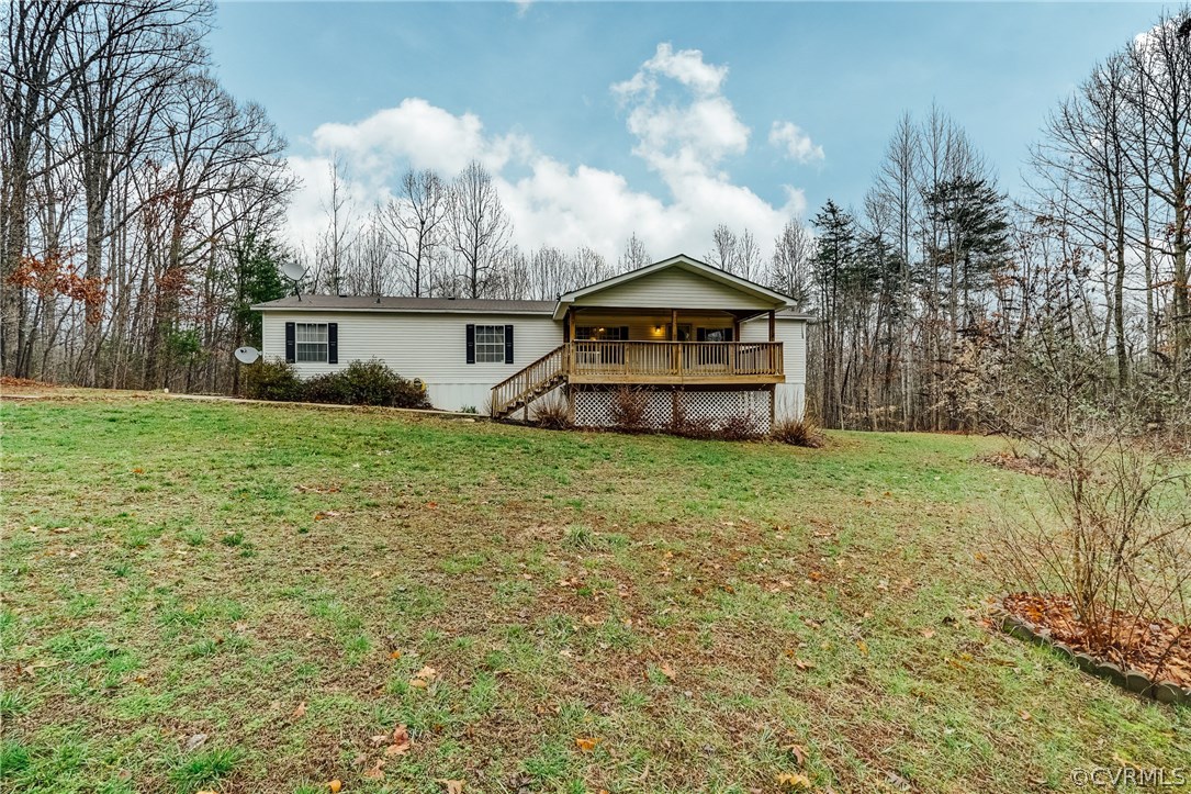 459 Bohannon Road Bumpass, VA 23024 - Photo 3 of 20 a view of a house with a yard