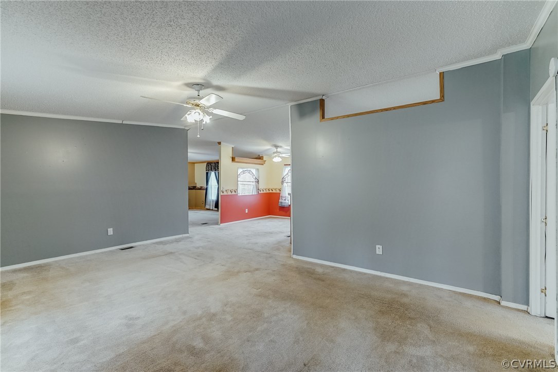 459 Bohannon Road Bumpass, VA 23024 - Photo 10 of 20 an empty room with closet and ceiling fan