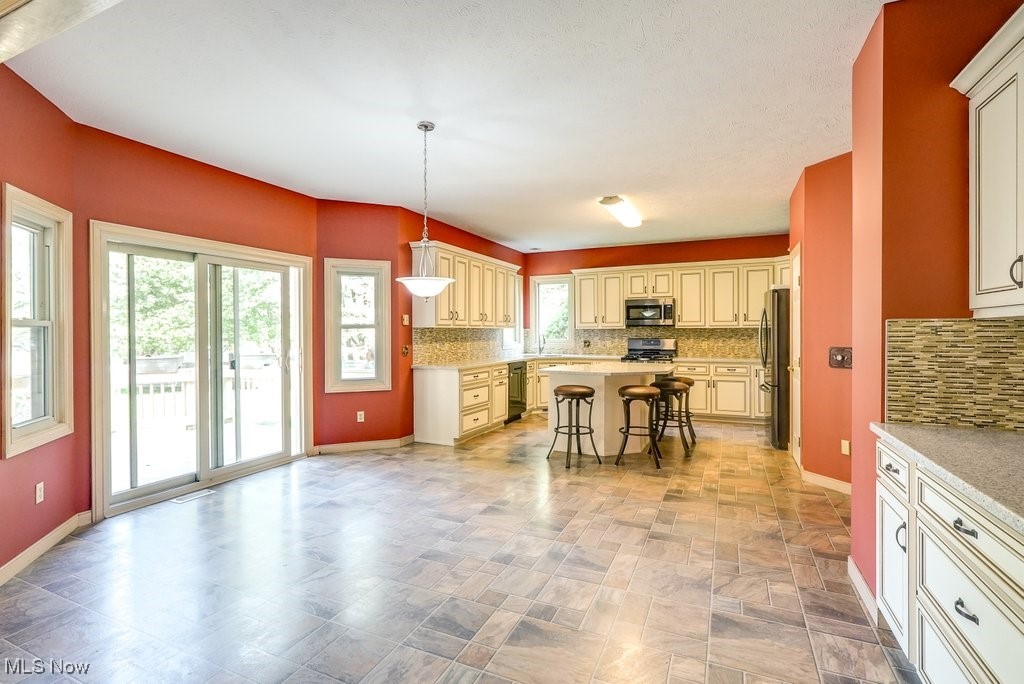 11662 Dunham Road Northfield, OH 44067 - Photo 9 of 50 Large dining area with wine rack & coffee bar