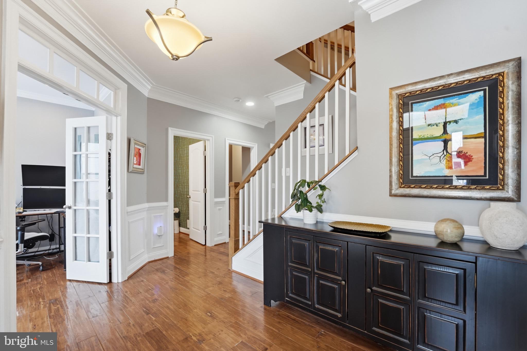 4873 Point Road Warrenton, VA 20187 - Photo 13 of 41 Inviting foyer with elegant staircase charm.