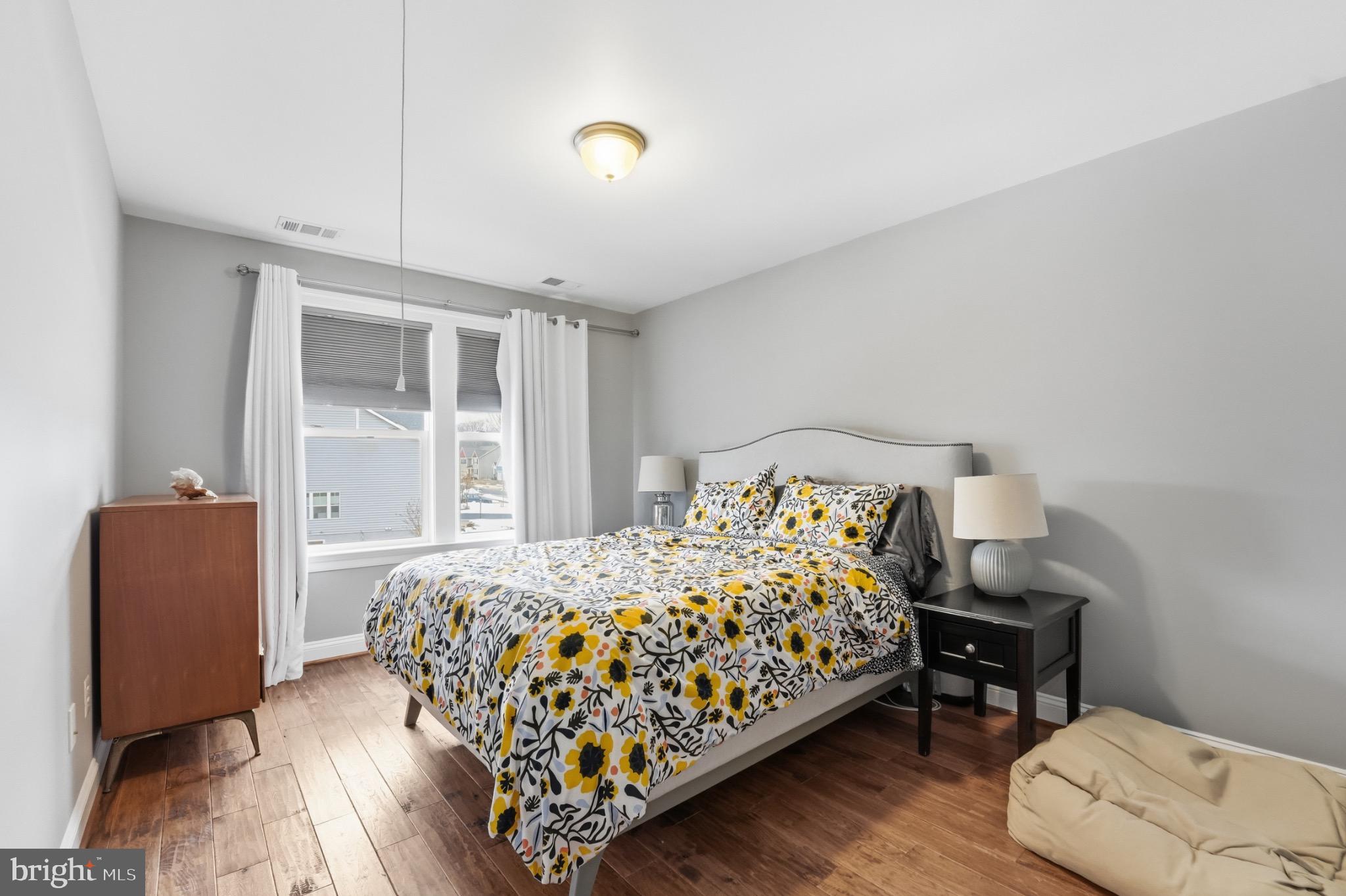 4873 Point Road Warrenton, VA 20187 - Photo 31 of 41 Bright and inviting bedroom with floral accents.