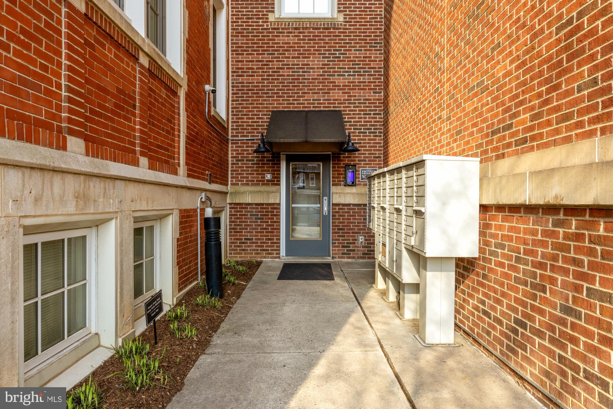 440 12th Street Northeast, Unit 211 Washington, DC 20002 - Photo 4 of 20 a view of a brick house with many windows