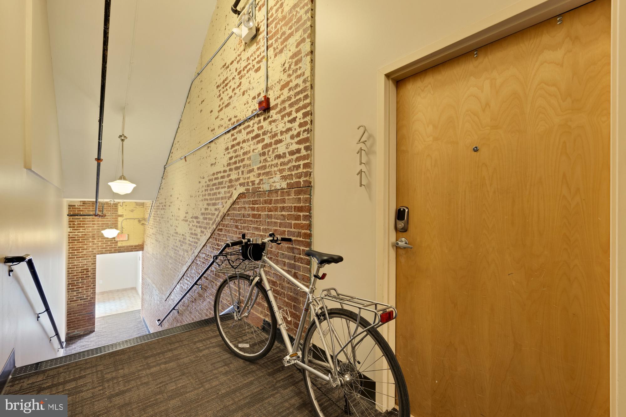 440 12th Street Northeast, Unit 211 Washington, DC 20002 - Photo 5 of 20 a view of an entryway with wooden floor