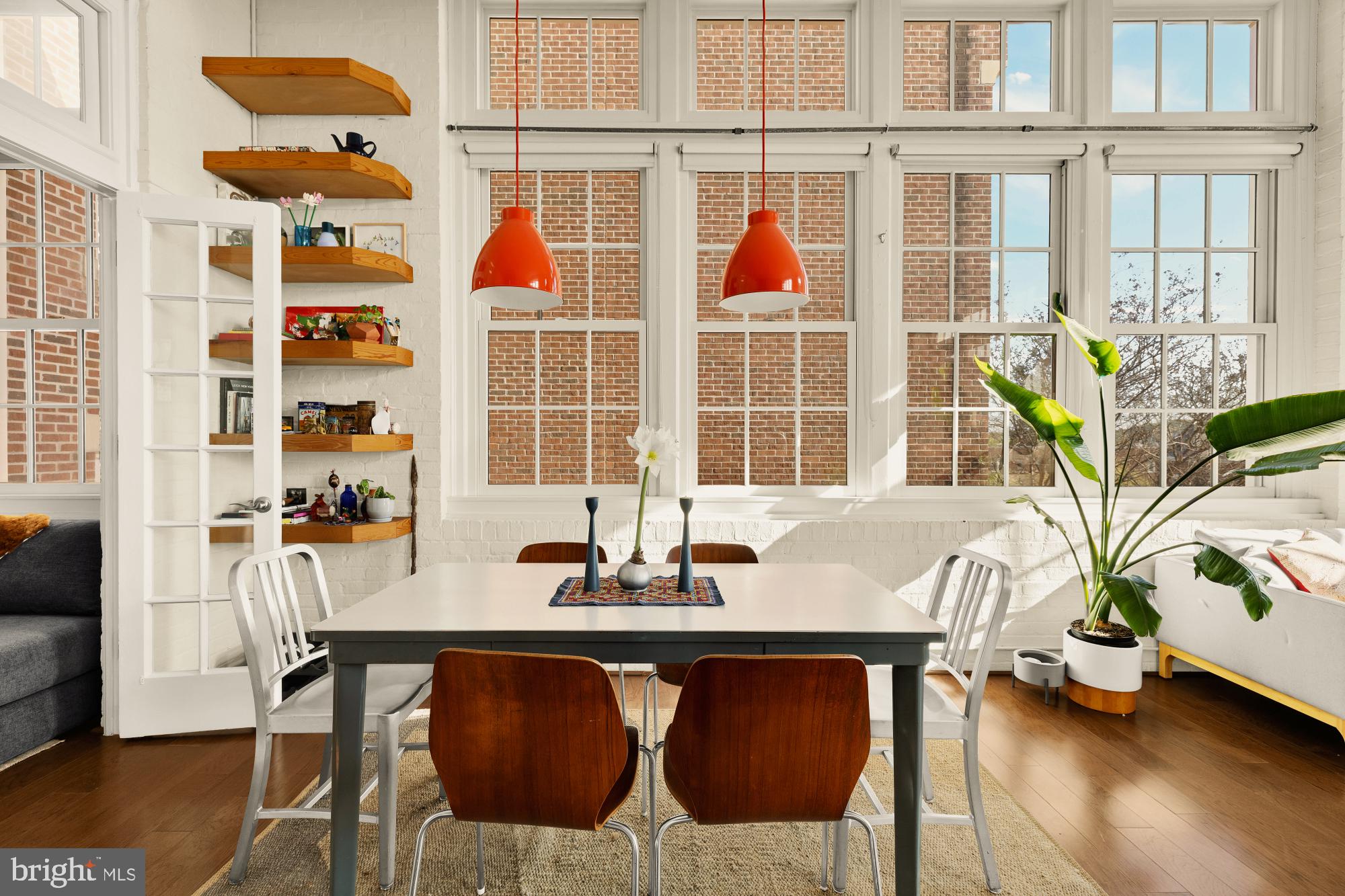 440 12th Street Northeast, Unit 211 Washington, DC 20002 - Photo 10 of 20 a dining room with furniture and wooden floor