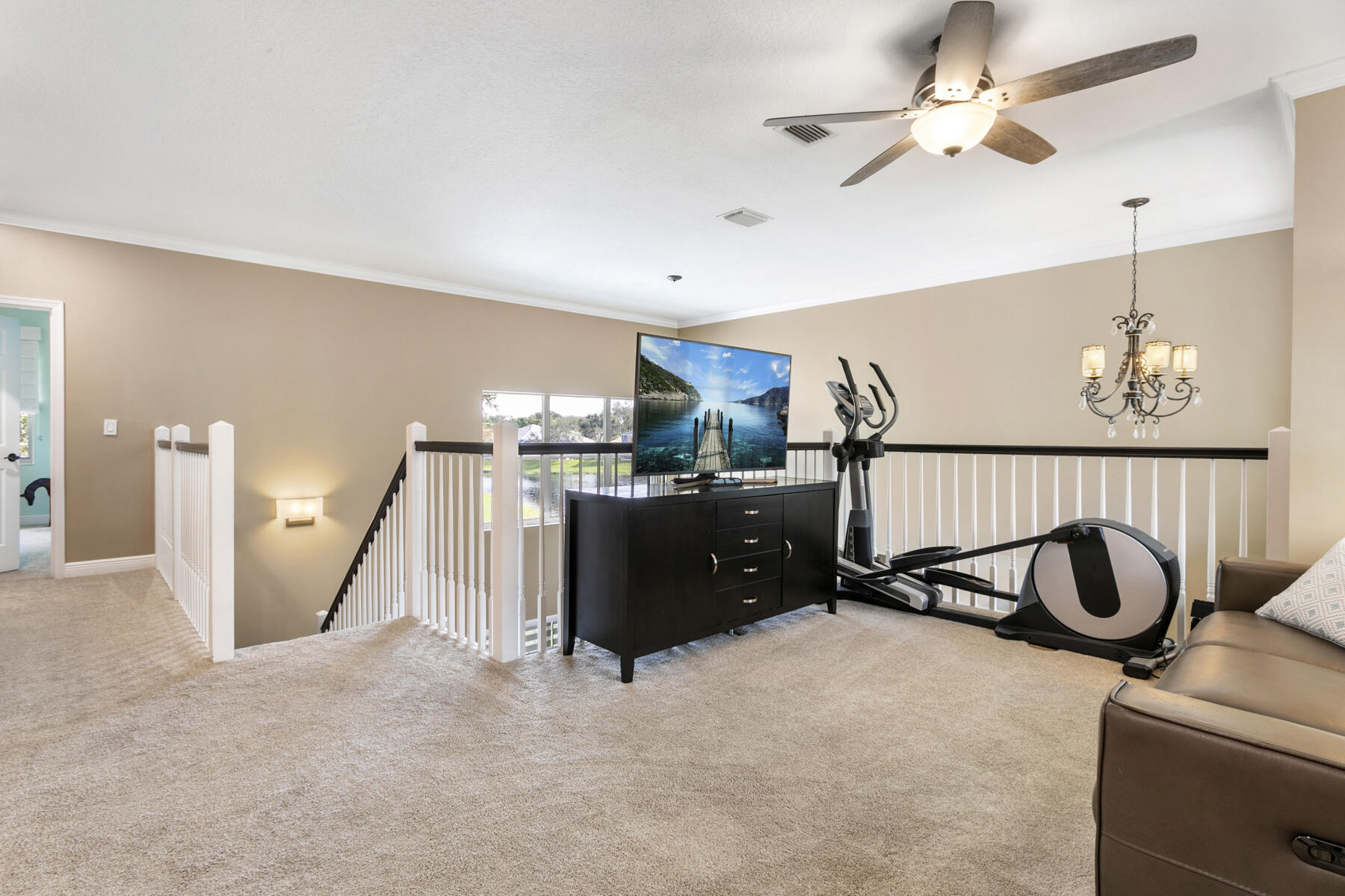 265 Swallowtail Lane Jupiter, FL 33458 - Photo 21 of 42 a view of a room with gym equipment