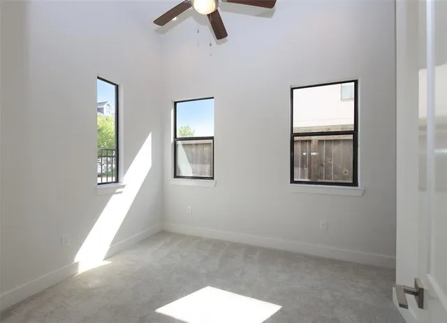 a view of an empty room and window