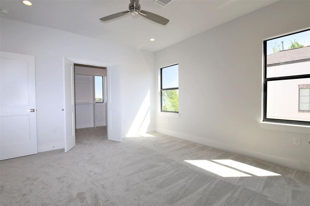 820 West 22nd Street Houston, TX 77008 - Photo 26 of 28 an empty room with windows and fan