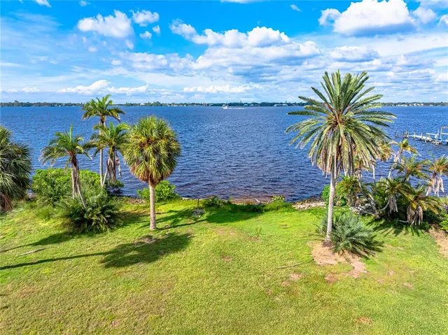 a view of a city with lawn chairs