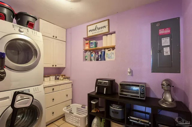 a view of a workspace with furniture and natural light
