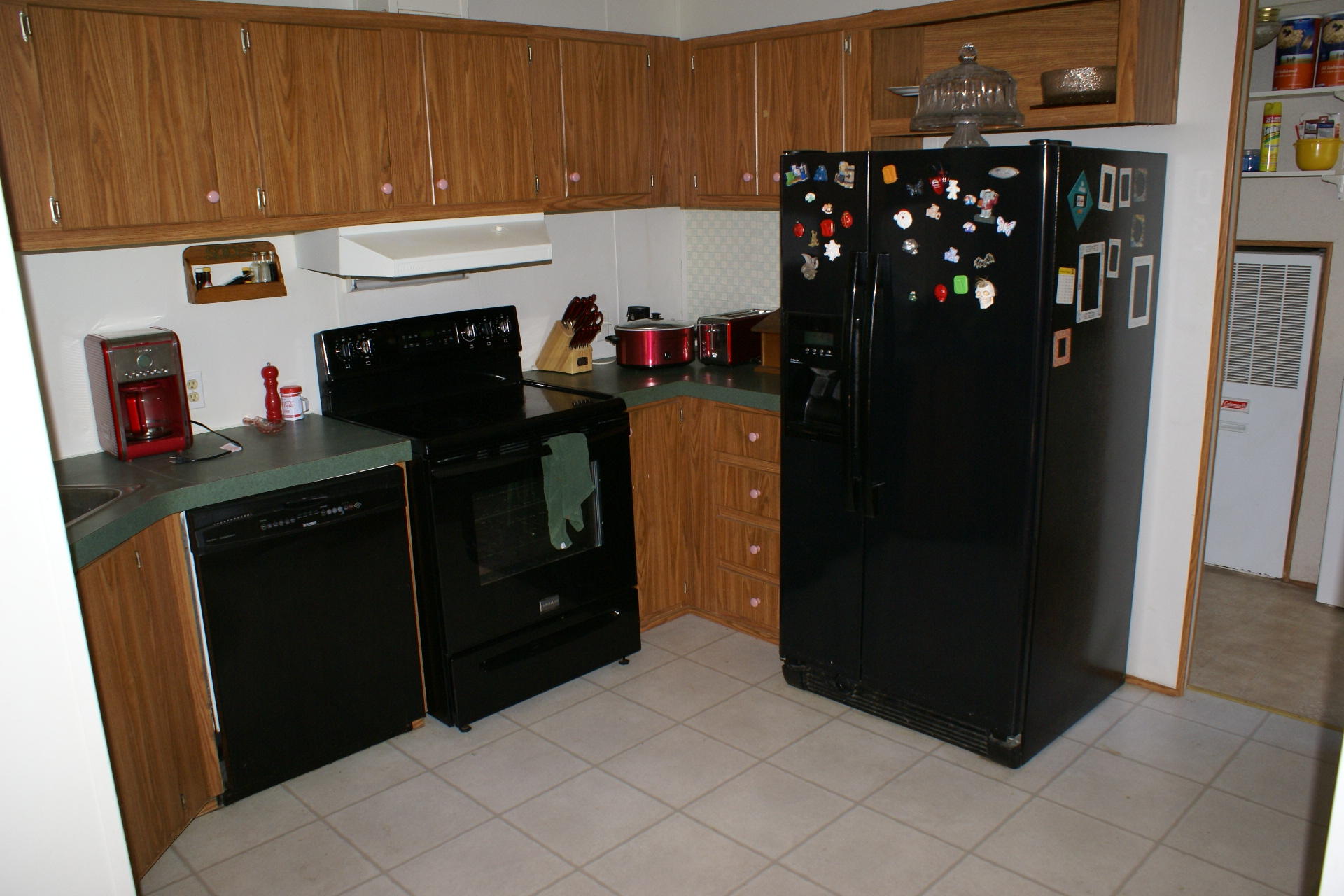 340 Farmington Road Hardy, VA 24101 - Photo 5 of 20 a kitchen with a refrigerator and a stove