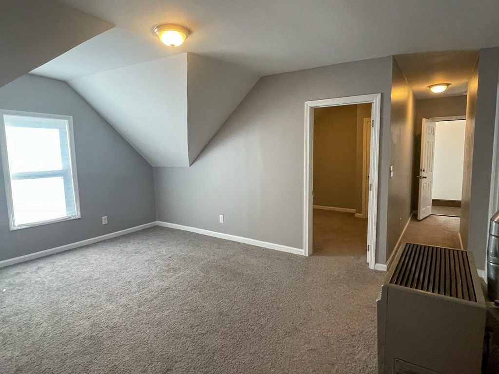 857 2nd Street Fall River, MA 02721 - Photo 34 of 38 a view of a livingroom with a staircase