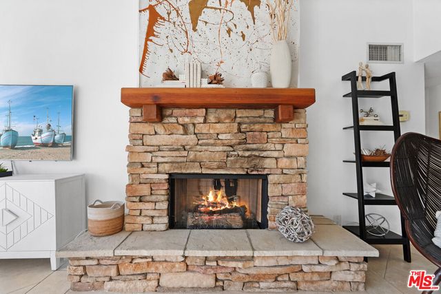 a fireplace with a wooden floor
