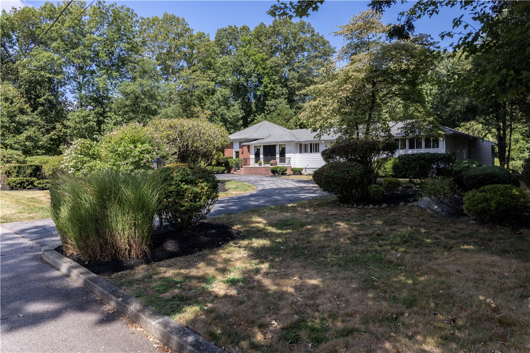 105 Gilbert Stuart Drive Warwick, RI 02818 - Photo 4 of 40 View from the street, semi-circular driveway