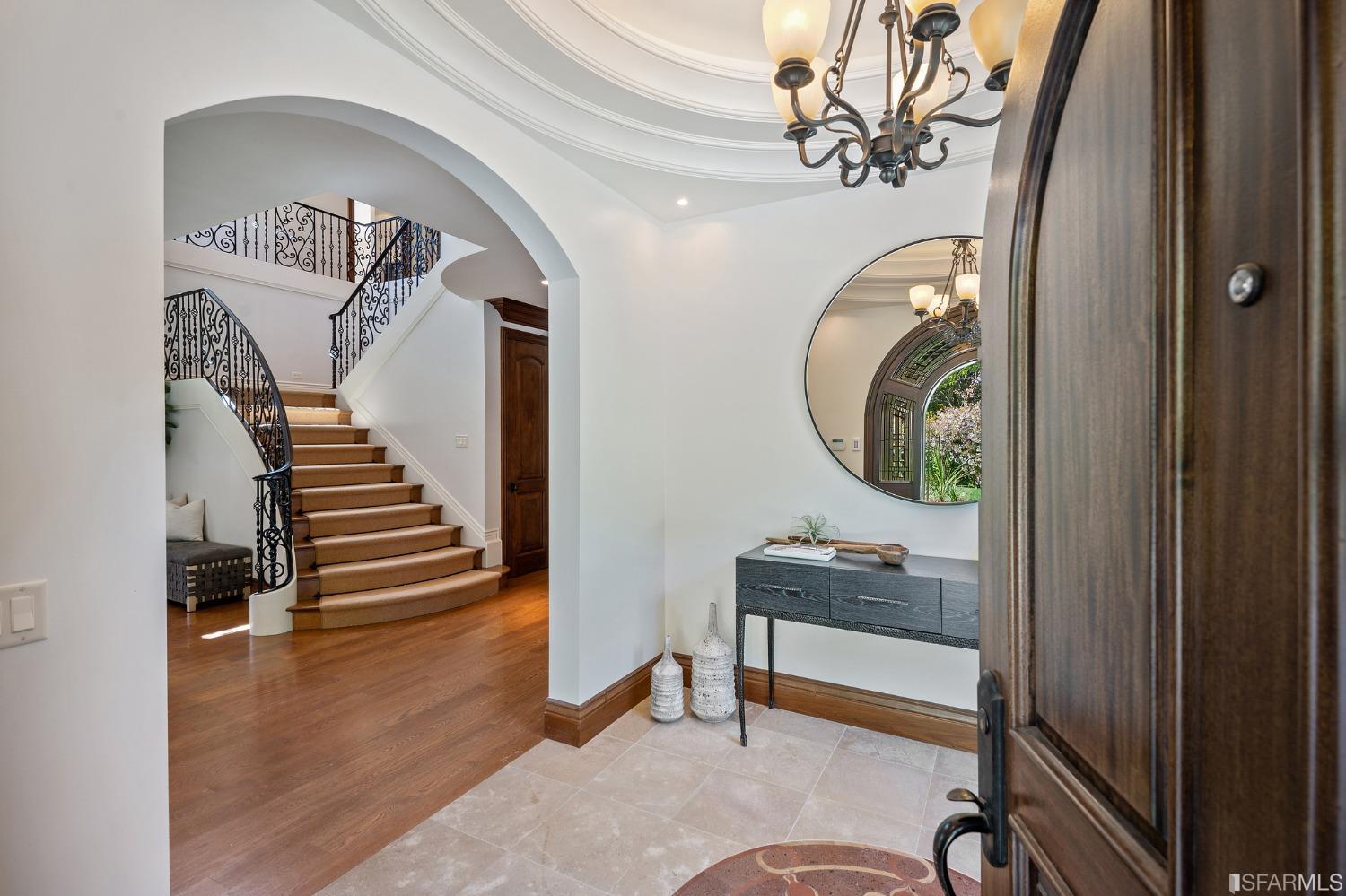 73 Irving Avenue Atherton, CA 94027 - Photo 16 of 99 a view of a hallway with entryway wooden floor and front door