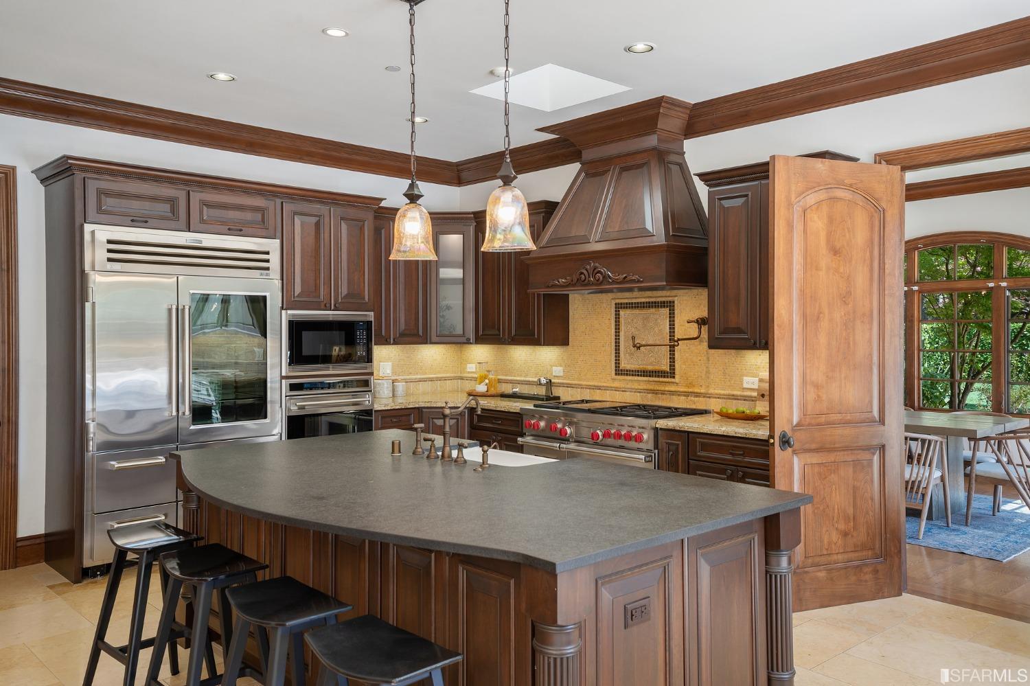 73 Irving Avenue Atherton, CA 94027 - Photo 25 of 99 a kitchen with stainless steel appliances granite countertop a stove and a refrigerator