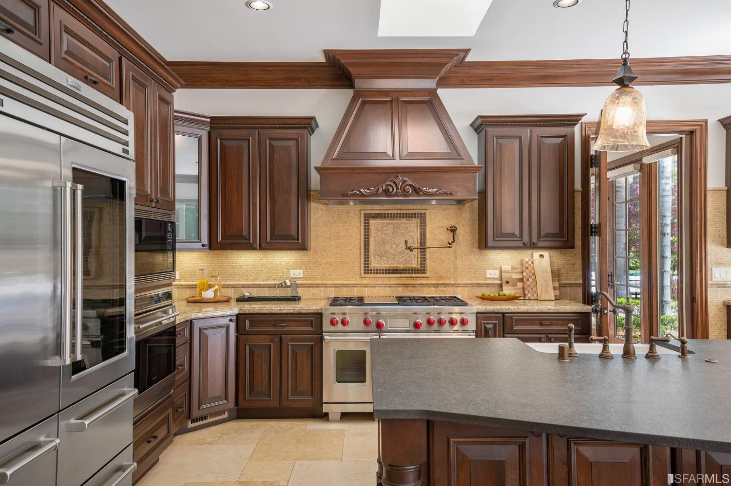 73 Irving Avenue Atherton, CA 94027 - Photo 27 of 99 a kitchen with a stove and a refrigerator
