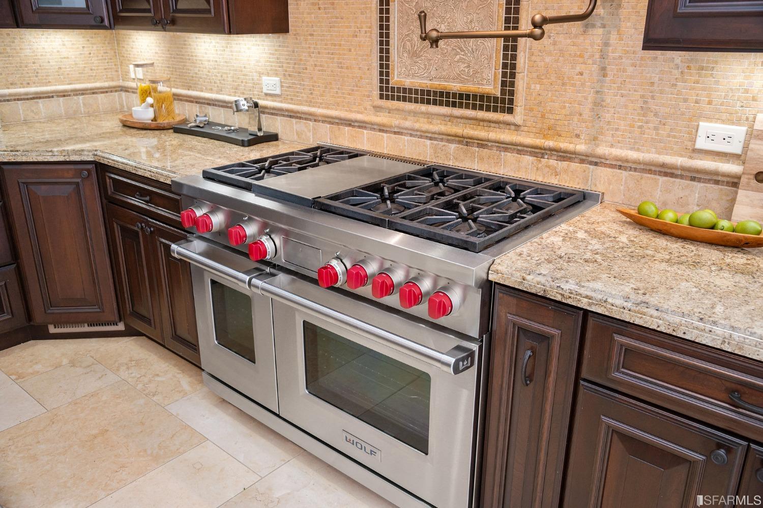 73 Irving Avenue Atherton, CA 94027 - Photo 30 of 99 a stove top oven sitting inside of a kitchen