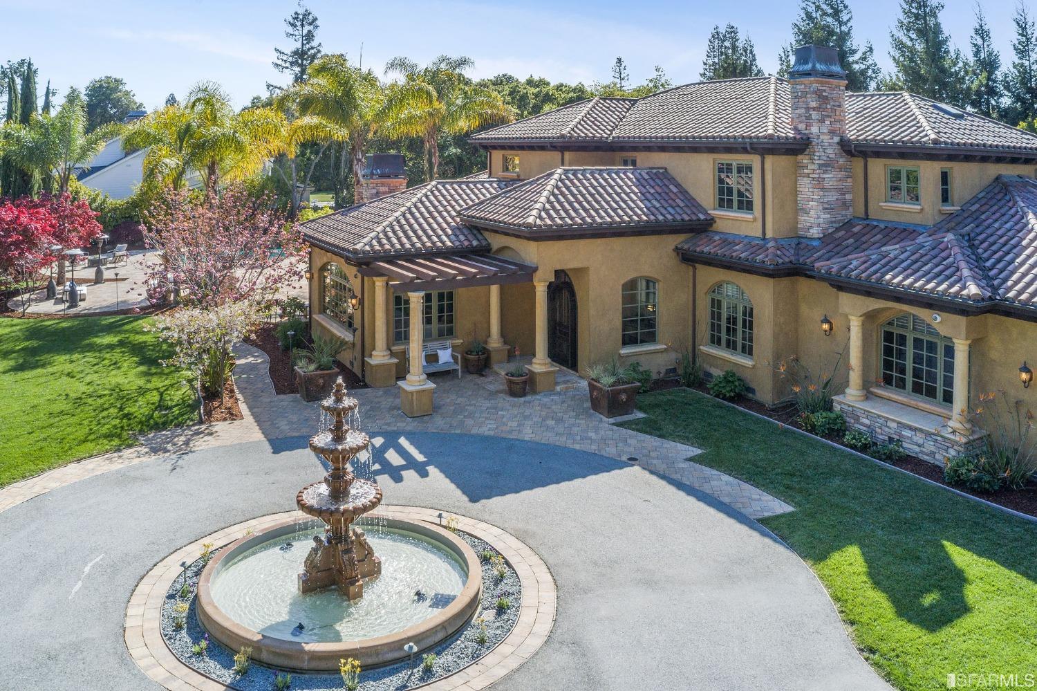 73 Irving Avenue Atherton, CA 94027 - Photo 5 of 99 a front view of a house with garden
