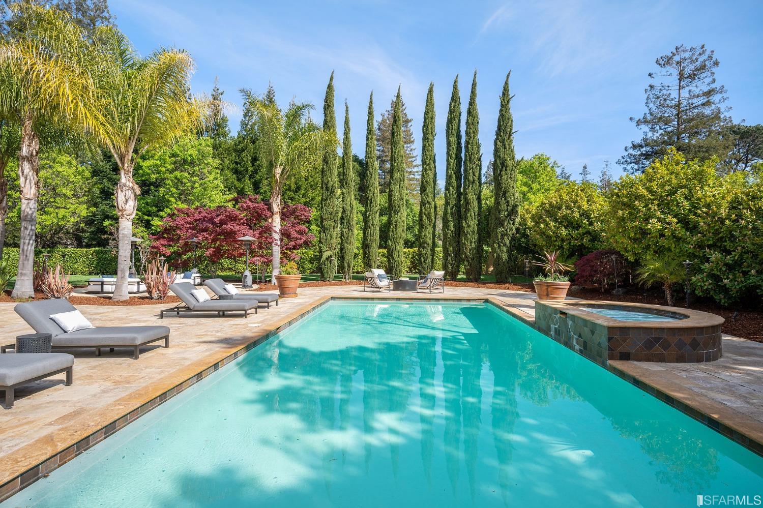 73 Irving Avenue Atherton, CA 94027 - Photo 78 of 99 a view of a swimming pool with a patio