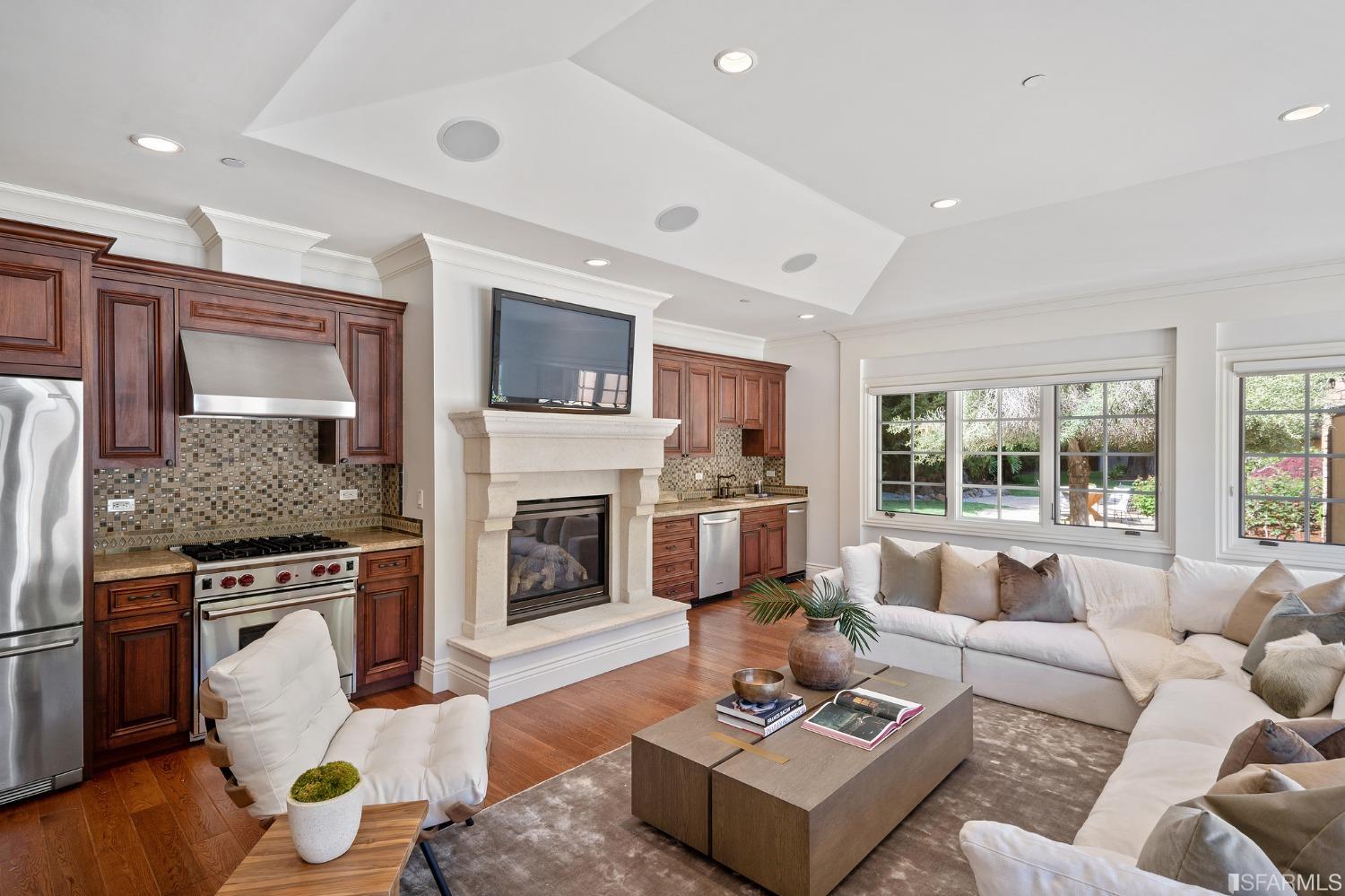 73 Irving Avenue Atherton, CA 94027 - Photo 81 of 99 a living room with furniture and a fireplace