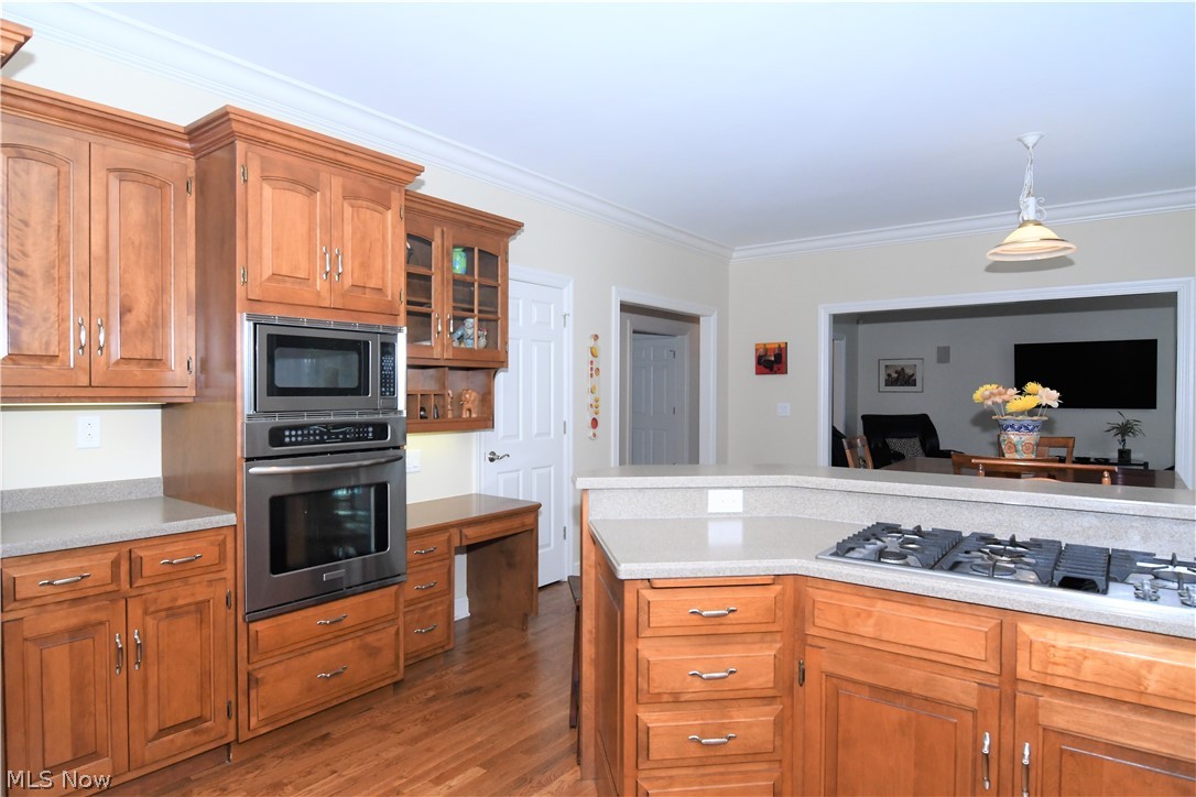659 Sunridge Road Fairlawn, OH 44333 - Photo 7 of 35 Schrock maple cabinetry, corian counters, planning desk and beautiful refinished H/W floors