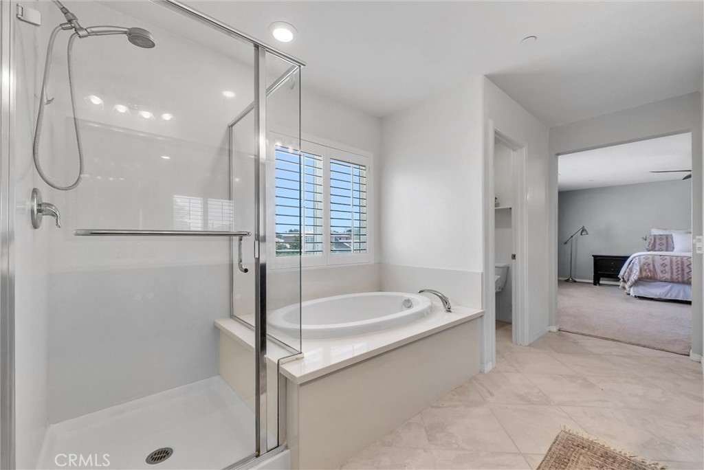 37656 Needlegrass Road Murrieta, CA 92563 - Photo 24 of 29 Step in shower and soaking tub too.