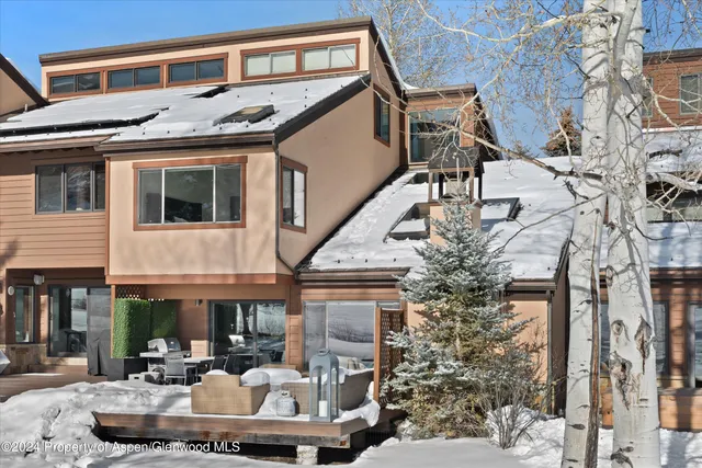 a front view of a building with multiple windows