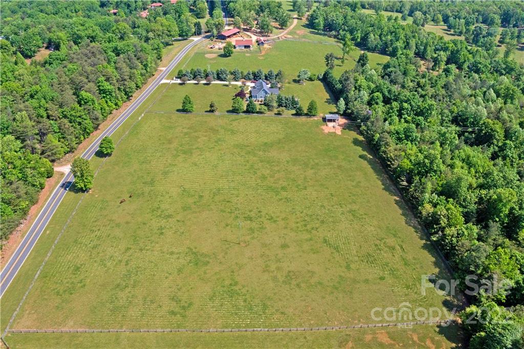 991 Golf Course Road Tryon, NC 28782 - Photo 1 of 43 a building with trees in the background