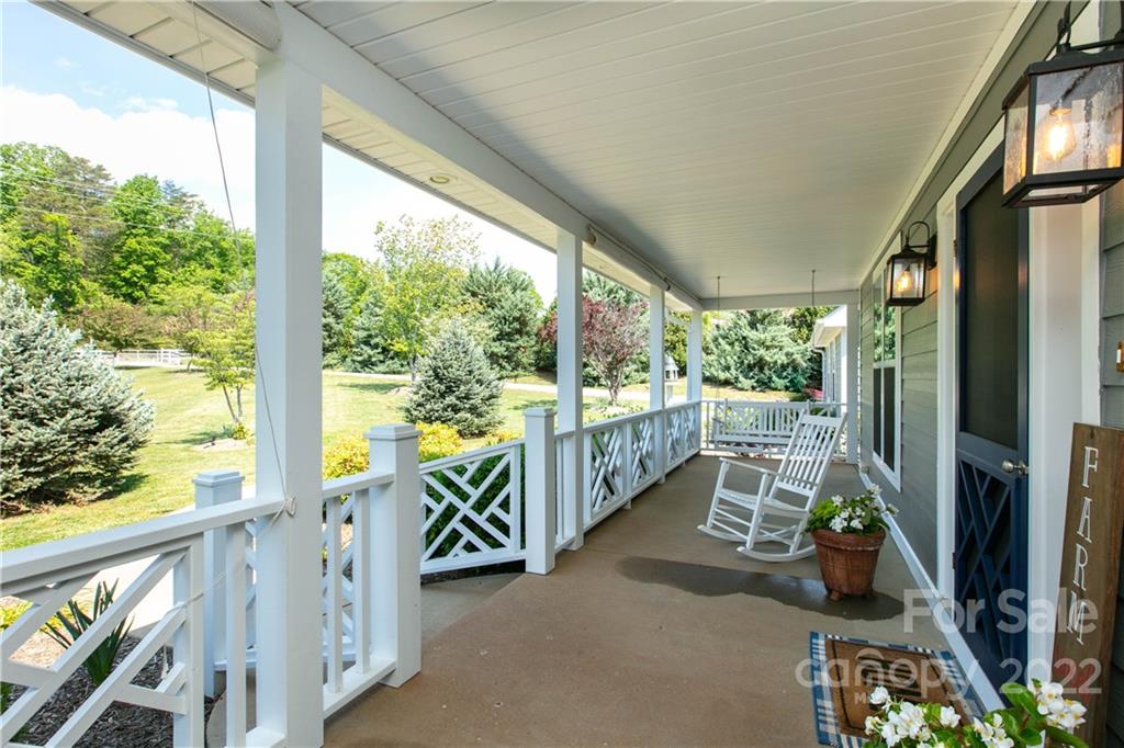 991 Golf Course Road Tryon, NC 28782 - Photo 12 of 43 a view of balcony with furniture