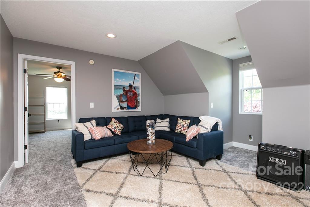 991 Golf Course Road Tryon, NC 28782 - Photo 14 of 43 a living room with furniture and wooden floor