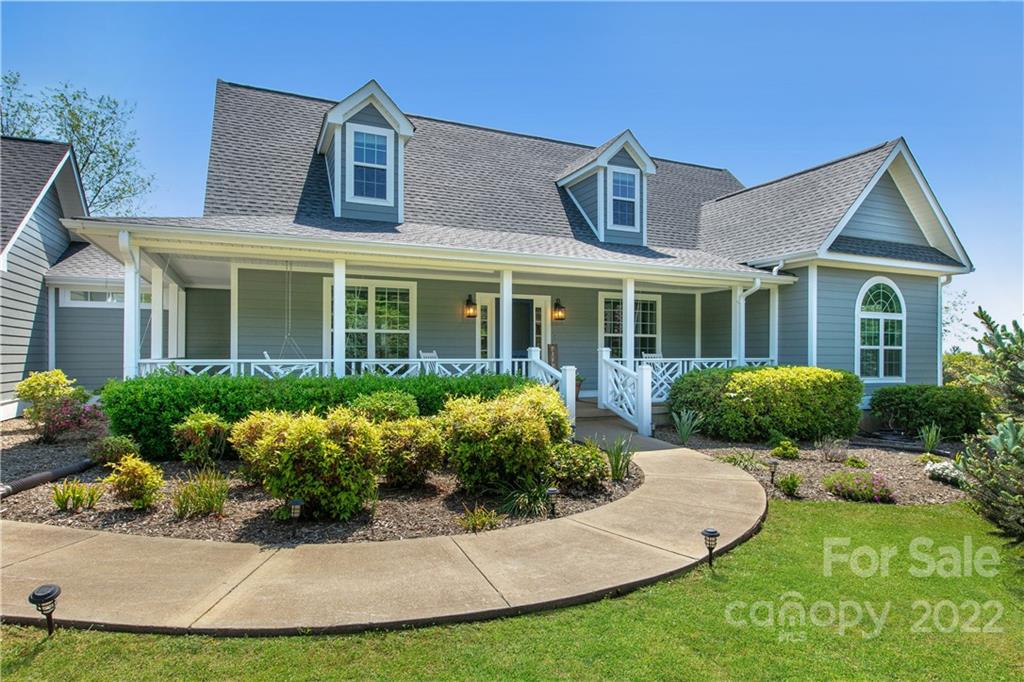 991 Golf Course Road Tryon, NC 28782 - Photo 2 of 43 front view of a house with a yard