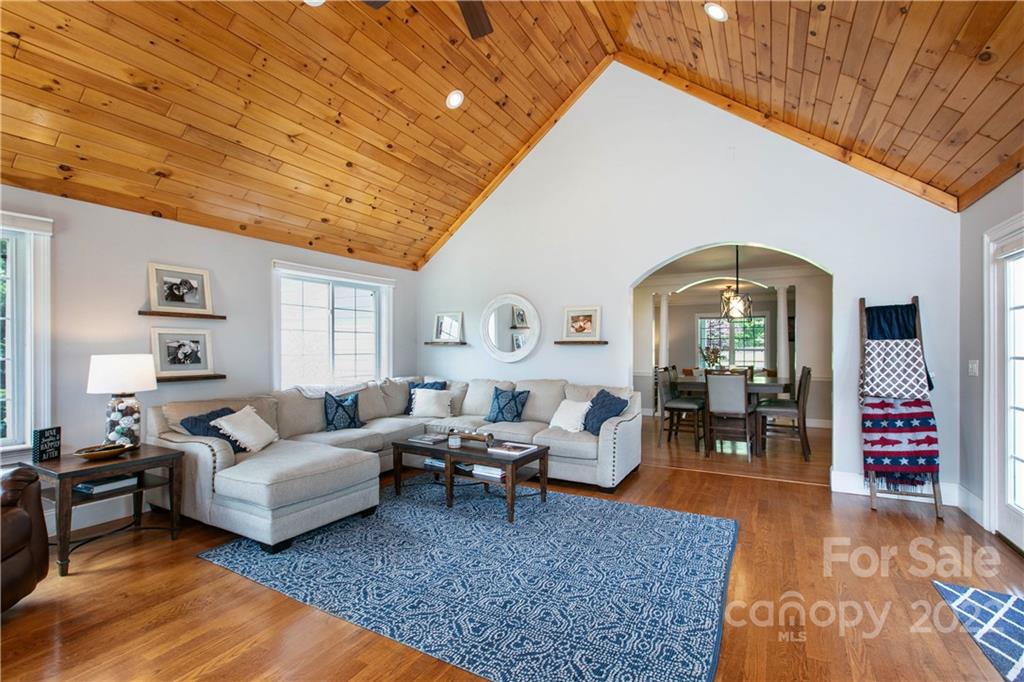 991 Golf Course Road Tryon, NC 28782 - Photo 25 of 43 a living room with furniture and wooden floor