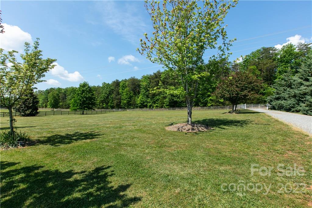 991 Golf Course Road Tryon, NC 28782 - Photo 26 of 43 a swimming pool with trees in the background