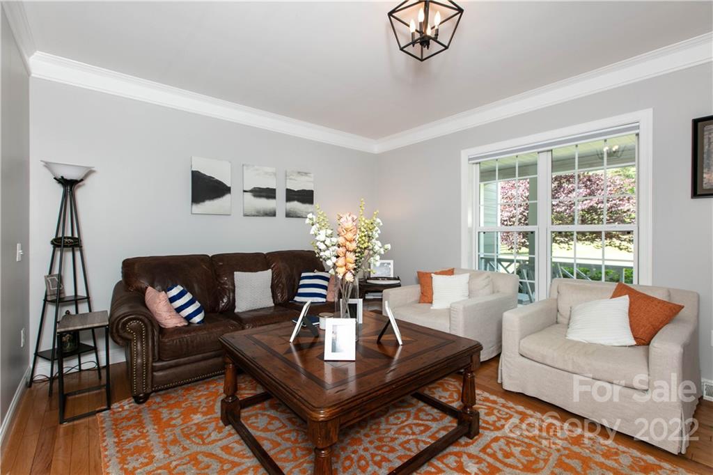 991 Golf Course Road Tryon, NC 28782 - Photo 9 of 43 a living room with furniture and a large window
