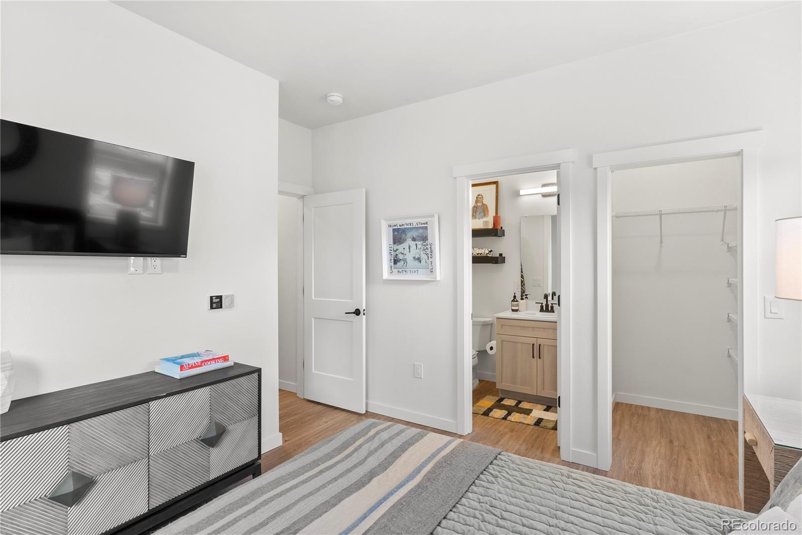 2155 Bighorn Road, Unit 201 Georgetown, CO 80444 - Photo 3 of 35 a living room with furniture and a flat screen tv