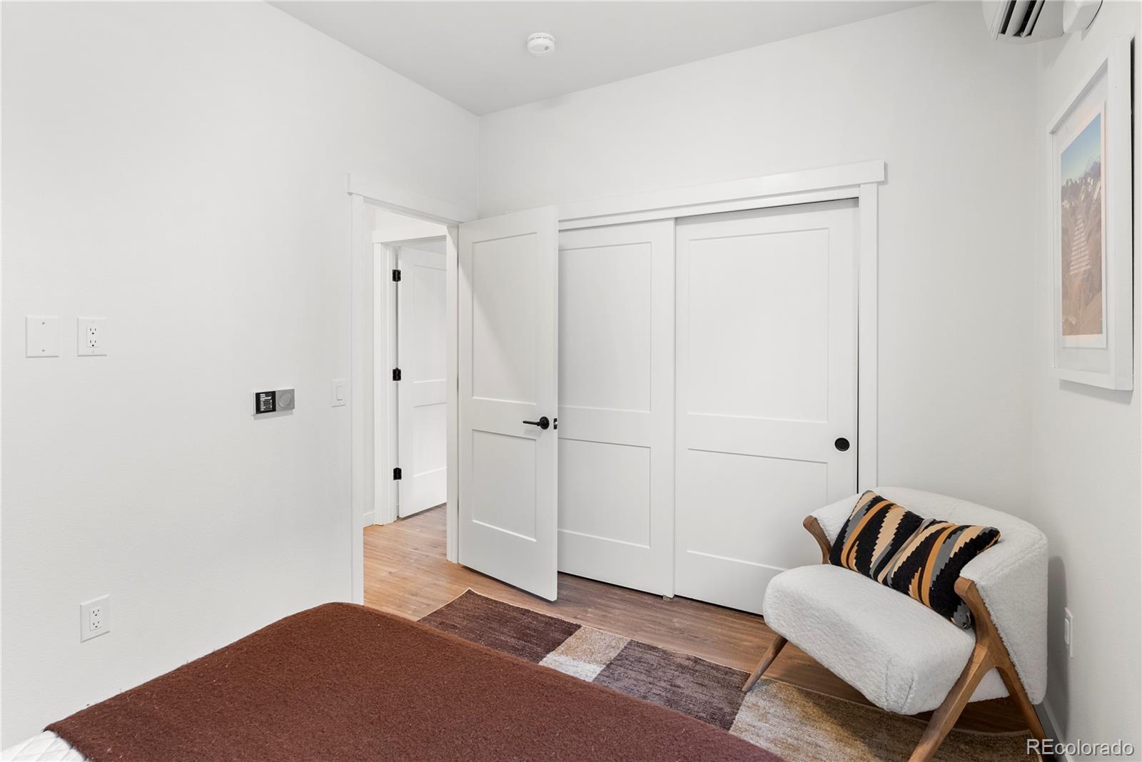 2155 Bighorn Road, Unit 201 Georgetown, CO 80444 - Photo 7 of 35 a bedroom with a bed and furniture