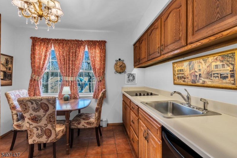 9 Corsica Road Hopatcong, NJ 07843 - Photo 19 of 33 a kitchen that has a sink and a stove