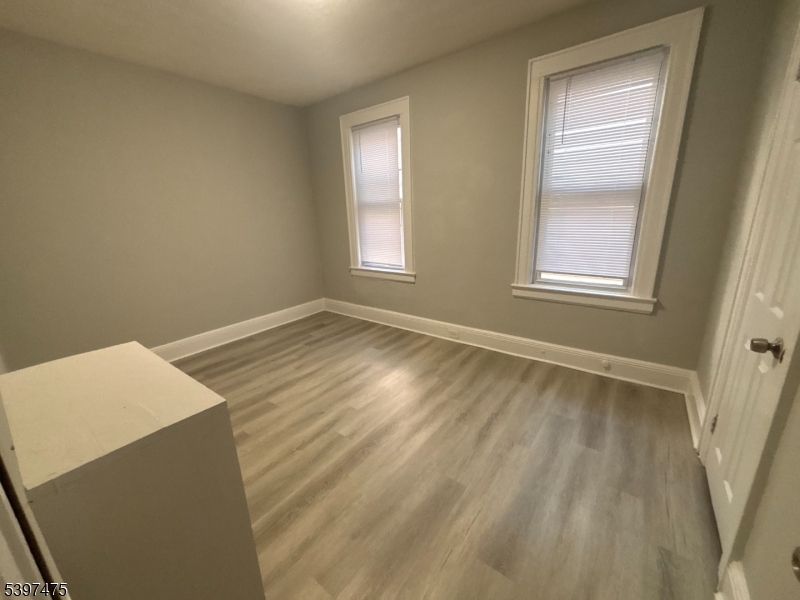 237 Fulton Street Paterson, NJ 07501 - Photo 11 of 11 a view of an empty room with a window