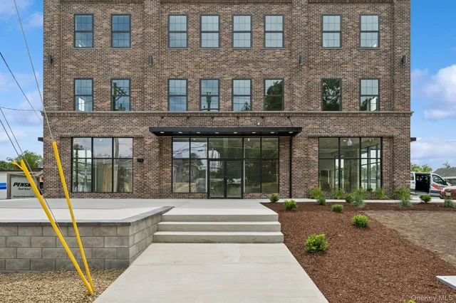 a view of a building with a porch