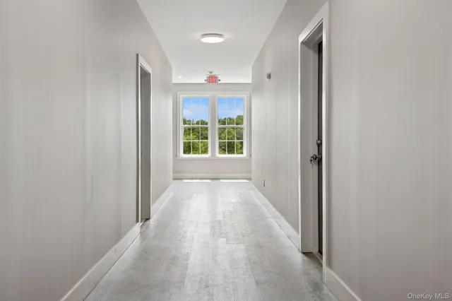 a view of an entryway with washer and dryer