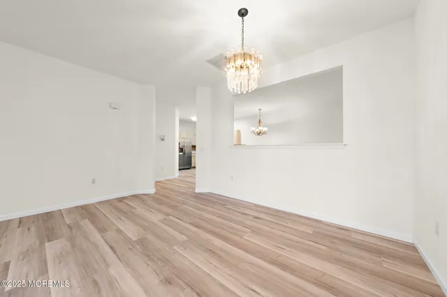 a view of a chandelier in a room