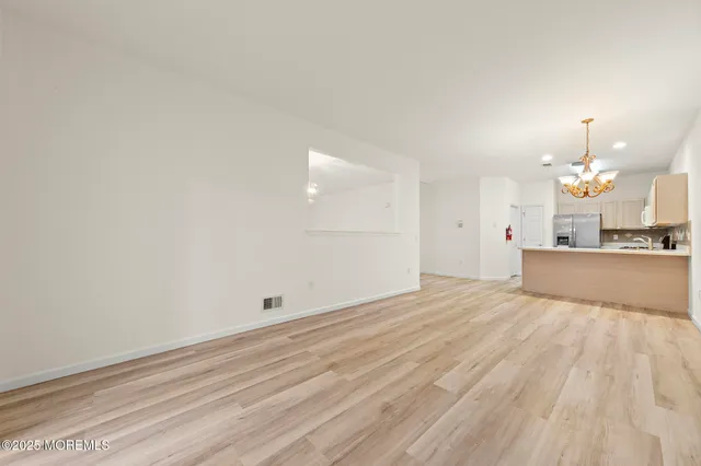 a view of a kitchen with marble kitchen and sink